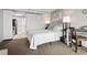 Cozy bedroom with neutral decor, a desk, and soft lighting at 6900 N Ocean Blvd. # 222, Myrtle Beach, SC 29572