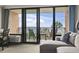 Well-appointed living room featuring an ocean view from the private balcony and sleeper sofa at 6900 N Ocean Blvd. # 222, Myrtle Beach, SC 29572