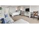 Open concept living room and bedroom combination, featuring a comfortable seating area and large windows at 6900 N Ocean Blvd. # 222, Myrtle Beach, SC 29572