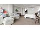 Open floor plan featuring a comfortable sofa, kitchen area, and bedroom at 6900 N Ocean Blvd. # 222, Myrtle Beach, SC 29572