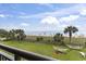 Beautiful view of beach and hammocks from a balcony at 6900 N Ocean Blvd. # 222, Myrtle Beach, SC 29572