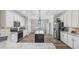 Well-equipped kitchen with stainless steel appliances and a central island at 7005 Wellesley Ct., Murrells Inlet, SC 29576