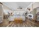 Open concept living room with hardwood floors and open flow to kitchen at 7005 Wellesley Ct., Murrells Inlet, SC 29576