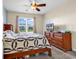 Bedroom with a ceiling fan and a window offering a view of the neighborhood at 701 Salleyport Dr. # 1110, Myrtle Beach, SC 29579