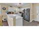 Bright kitchen featuring stainless steel appliances, white cabinets, and a breakfast bar at 701 Salleyport Dr. # 1110, Myrtle Beach, SC 29579