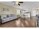 Relaxing living room with dining area, a partial view of the kitchen with hardwood flooring at 701 Salleyport Dr. # 1110, Myrtle Beach, SC 29579