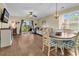 Comfortable living area adjoining a dining space, and a kitchen with natural light at 701 Salleyport Dr. # 1110, Myrtle Beach, SC 29579
