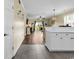 Open floor plan offering kitchen view to a cozy living room with a sliding glass patio door at 701 Salleyport Dr. # 1110, Myrtle Beach, SC 29579