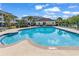 Sparkling community pool with lounge chairs and a cabana, perfect for relaxing and enjoying the sunny weather at 701 Salleyport Dr. # 1110, Myrtle Beach, SC 29579