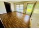Bright living room featuring new laminate floors and three points of entry at 704 W Alder St., Andrews, SC 29510