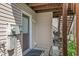 Cozy back porch with seating area and outdoor access for relaxing or entertaining at 755 Burcale Rd. # E-3, Myrtle Beach, SC 29579