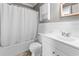 Bright bathroom featuring a shower-tub combination and a white vanity with storage at 755 Burcale Rd. # E-3, Myrtle Beach, SC 29579