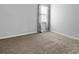 A clean bedroom is shown with a large window with curtains at 755 Burcale Rd. # E-3, Myrtle Beach, SC 29579