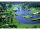 Aerial view of a beautiful golf course with water hazards and lush greenery at 755 Burcale Rd. # E-3, Myrtle Beach, SC 29579