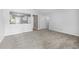 Spacious living room featuring new carpet and an open layout to the kitchen at 755 Burcale Rd. # E-3, Myrtle Beach, SC 29579
