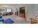 Upstairs bonus room featuring a workspace, closet, and window for ample natural light at 77 Redwing Ct., Pawleys Island, SC 29585
