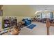 Large bonus room with comfortable seating, desk area, and shelves for storage or display at 77 Redwing Ct., Pawleys Island, SC 29585