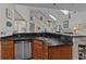 Kitchen features stainless steel appliances and an open view of the living area at 77 Redwing Ct., Pawleys Island, SC 29585