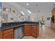 Open concept kitchen featuring stainless steel appliances and granite countertops at 77 Redwing Ct., Pawleys Island, SC 29585