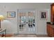 Bright sunroom entrance with French doors and natural light at 77 Redwing Ct., Pawleys Island, SC 29585