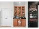 Home bar area featuring cabinet storage and a decorative chalkboard wall design at 861 Murray Ave., Myrtle Beach, SC 29577