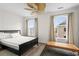 Bright bedroom with hardwood floors, a ceiling fan, and large windows at 861 Murray Ave., Myrtle Beach, SC 29577