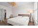 Bedroom featuring a neutral palette, a unique fan, and plenty of light at 861 Murray Ave., Myrtle Beach, SC 29577