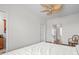 Bright bedroom with hardwood floors, a unique fan, and access to a closet at 861 Murray Ave., Myrtle Beach, SC 29577