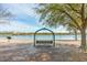 Relaxing swing bench by the lake offering serene views and a peaceful retreat at 861 Murray Ave., Myrtle Beach, SC 29577