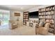 Cozy living room with built-in bookshelves and comfortable seating at 900 47Th Ave. N, Myrtle Beach, SC 29577