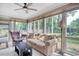 Cozy sunroom filled with natural light and a comfortable seating area at 900 47Th Ave. N, Myrtle Beach, SC 29577