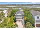 Stunning aerial view of a two-story home, showcasing its proximity to the waterway, and scenic surroundings at 92 High Hammock Way, Pawleys Island, SC 29585
