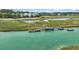 Aerial view of a beautiful coastal community with private docks and waterways at 92 High Hammock Way, Pawleys Island, SC 29585