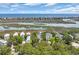 Aerial view of waterfront community with waterways, private docks, and coastal homes at 92 High Hammock Way, Pawleys Island, SC 29585