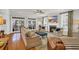 Bright living room with a fireplace, sliding doors to the outside, and comfortable seating, offering a relaxing retreat at 92 High Hammock Way, Pawleys Island, SC 29585