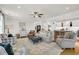 Spacious living room with stylish furnishings, a ceiling fan, and open layout, ideal for entertaining guests at 92 High Hammock Way, Pawleys Island, SC 29585