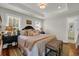 Comfortable main bedroom features an ensuite bath and calming, neutral decor at 92 High Hammock Way, Pawleys Island, SC 29585