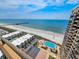 Gorgeous aerial view showcasing the condo's proximity to the beach, pier, and outdoor pool areas at 9650 Shore Dr. # 2207, Myrtle Beach, SC 29572