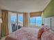Bedroom with balcony access and view of the ocean at 9650 Shore Dr. # 2207, Myrtle Beach, SC 29572
