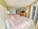 Bright bedroom with two beds and a wooden dresser at 9650 Shore Dr. # 2207, Myrtle Beach, SC 29572
