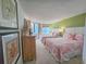 Bright bedroom with two beds, a dresser, and balcony access at 9650 Shore Dr. # 2207, Myrtle Beach, SC 29572