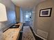 Inviting hallway with decorative accents and a glimpse into the bright and open living space at 9650 Shore Dr. # 2207, Myrtle Beach, SC 29572