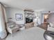 Comfortable living room with stylish furnishings, a TV, and views of the surrounding neighborhood at 9650 Shore Dr. # 2207, Myrtle Beach, SC 29572