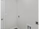 Compact laundry room with utility hookups and neutral walls, designed for functionality at 1000 Sentinel Ct., Little River, SC 29566