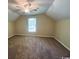 Carpeted bedroom with a ceiling fan and natural light through the window at 1000 Weldon Ln., Conway, SC 29526