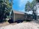Back exterior view of home with small deck and air conditioning units at 1000 Weldon Ln., Conway, SC 29526