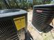 Two HVAC units, including one Goodman brand unit, and an EnergyGuide label at 1000 Weldon Ln., Conway, SC 29526