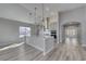 Open concept kitchen with an island, stainless steel appliances, and hardwood floors at 1075 Laconic Dr., Myrtle Beach, SC 29588