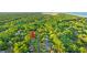 Beautiful aerial view of property nestled among lush greenery, showcasing location near the coast at 12 Jerry Ct., Pawleys Island, SC 29585