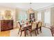 Elegant dining room with a wooden table, stylish chairs, and sophisticated decor, perfect for entertaining at 12 Jerry Ct., Pawleys Island, SC 29585